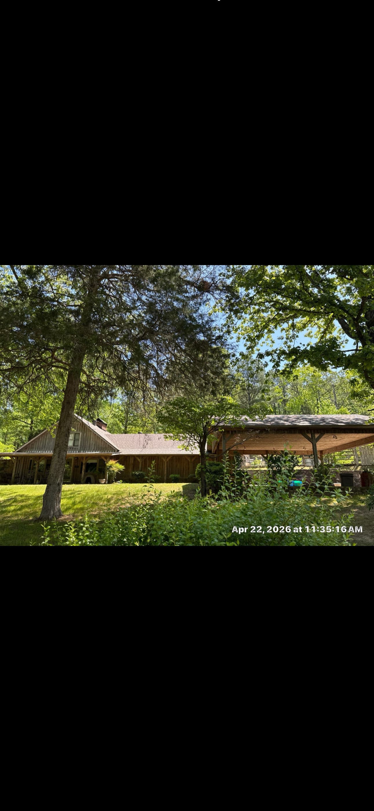 Full roof tear off and install on a wooded cabin in brilliant al image