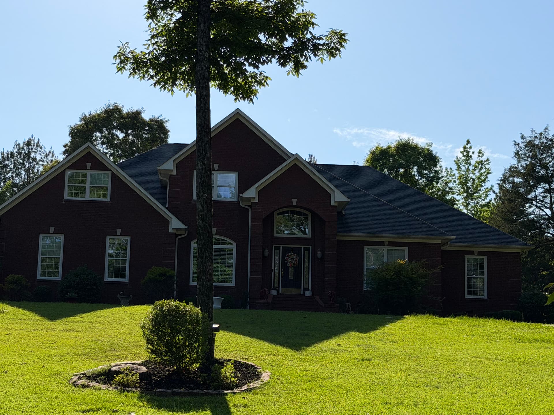 Fresh Shingle Roof on a Beautiful Brick Home image